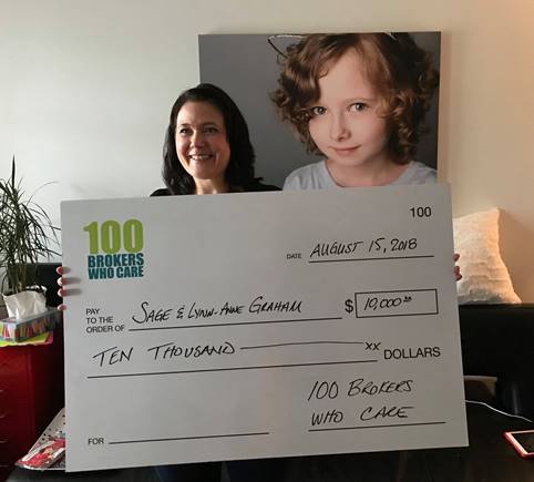 100 brokers who care cheque presented to mother